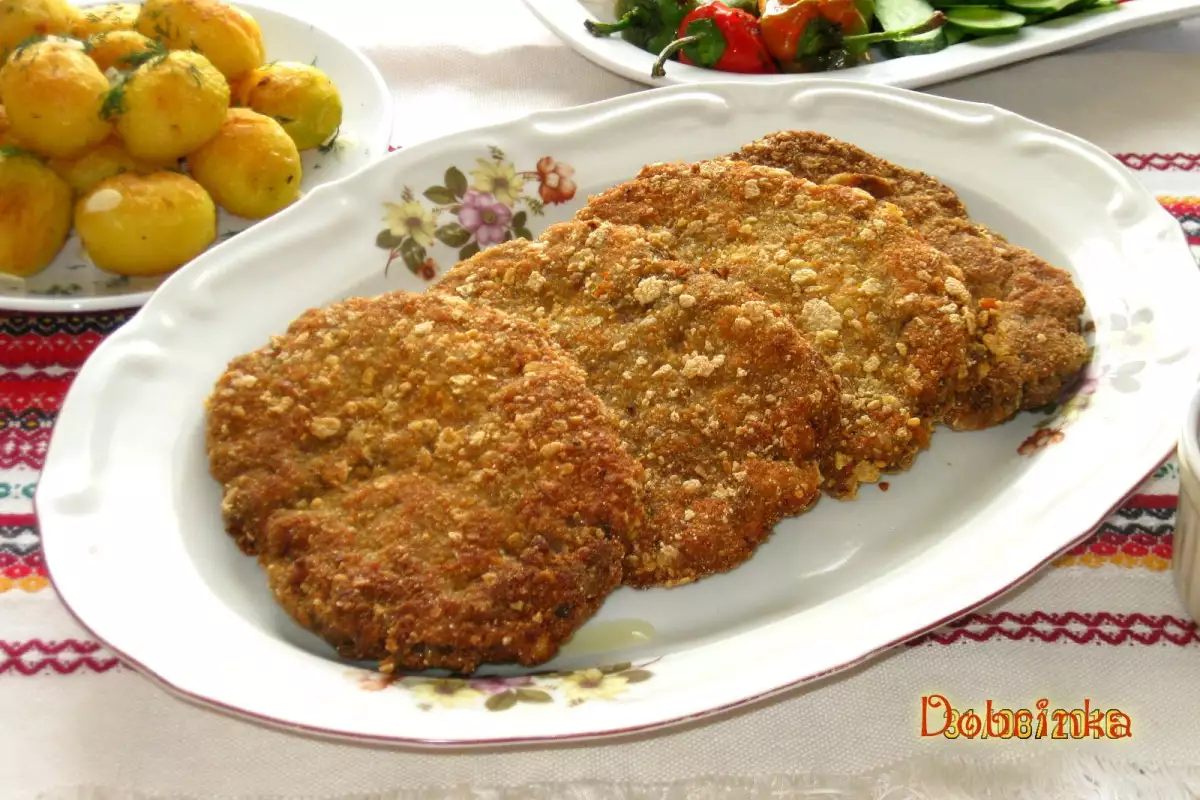 Panierte Hackfleisch Schnitzel mit Cornflakes - Rezept | Bonapeti.de