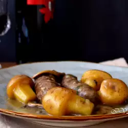 Würstchen mit Pilzen und Kartoffeln
