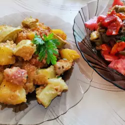 Hähnchenfleisch mit Zucchini, Kartoffeln und Parmesan