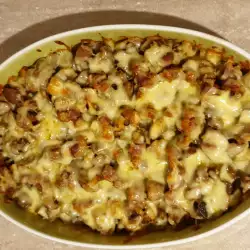 Hähnchenmägen mit Pilzen und Käse im Ofen