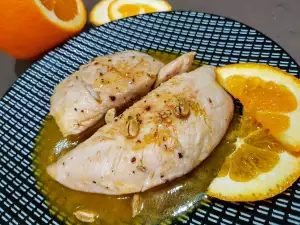 Hähnchen mit Orange in der Pfanne