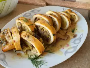Gefüllter Tintenfisch mit Grünkohl und Prosciutto