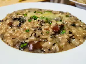 Risotto mit Herbsttrompeten Pilzen