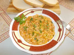 Zucchini mit Tomaten und Reis