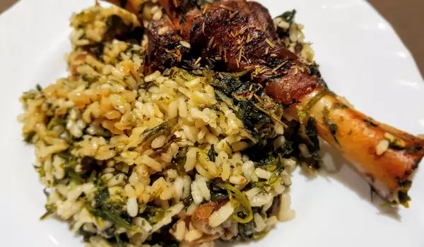 Lammhaxe mit Reis und Spinat