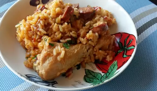 Hähnchenschenkel mit Chorizo ​​​​und Reis