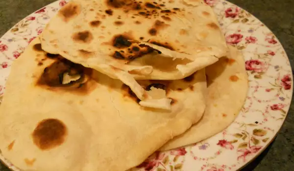 Indisches Chapati Fladenbrot in der trockenen Pfanne