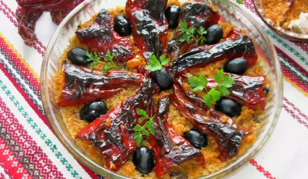 Gefüllte Paprika mit Bulgur, Champignons und Oliven
