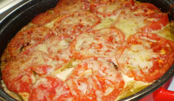 Schichtauflauf aus Zucchini, Tomaten und Reis