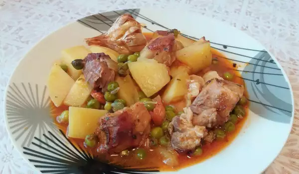 Schweinefleisch mit Erbsen und Kartoffeln im Ofen