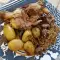 Gebratene Lammkeule mit Reis, Kartoffeln und Champignons