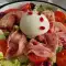 Salat mit Granatapfel und Burrata