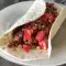 Burrito mit Aubergine und Tomate