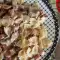 Farfalle mit Speck und Pilzen