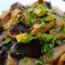 Geschmorte Champignons mit Weißwein