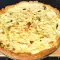 Quiche mit Hüttenkäse und Oliven