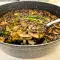 Im Ofen gebratener Reis mit Ampfer und kleinen Wald Champignons