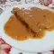 Zarte Schweinekoteletts in Weinsoße