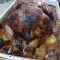 Ganzes Brathähnchen mit Kartoffeln