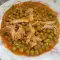 Hähnchen mit Erbsen und Karotten