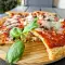 Pizza mit Speck und Blumenkohlteig