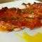 Schweinekoteletts mit Wein und Tomaten