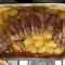 Gefülltes Kaninchen im Ofen mit Kartoffeln
