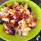 Kartoffelsalat mit Oktopus und Oliven