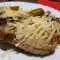 Schweinekoteletts mit Parmesan