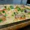 Klassisches Schweinefleisch mit Reis im Ofen