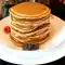 Diätetische vegane Pfannkuchen mit Banane