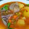 Rindereintopf mit Erbsen und Kartoffeln