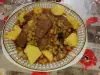 Hirsch mit Erbsen und neuen Kartoffeln