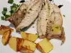 Weißfischfilet mit Lauchzwiebeln und Kartoffeln garniert